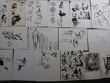 a lot of drawings on the wall of a room