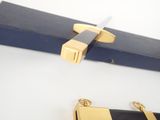 a knife that is laying on top of a box