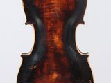an old violin with a wooden back and a brown body
