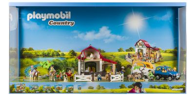 Le coffret « Playmobil Country » se présente dans une boîte contenant un cheval et une calèche