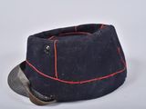a close up of a hat with red stitching on it