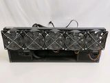 a close up of a computer case with fan and power supply