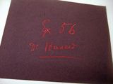 a red piece of paper with writing on it