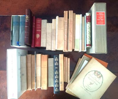 a lot of books that are on the table