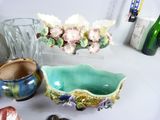 many vases that are sitting on a table