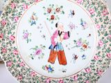a plate that has a picture of a woman on it