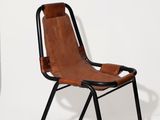 pair of leather chairs with black legs and a brown leather seat