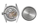 an image of a close up of a watch with a metal case