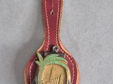 une image représentant une cuillère contenant une pièce de monnaie