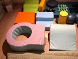 a large number of toys on the floor in the room