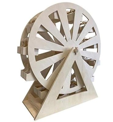 une maquette en bois d'une grande roue posée sur un socle