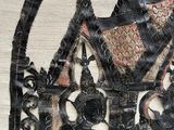 an image of a purse made out of black and white material