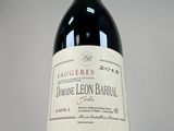 a bottle of wine that is sitting on a table