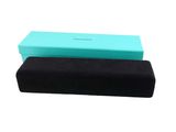 a close up of a pair of glasses sitting on top of a box