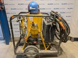 a machine that is sitting on a cart in a room