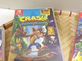 two nintendo wii games are sitting on a table next to each other