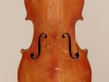 a close up of a violin on a white background