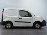 a white van that is parked in a parking lot