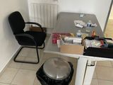 a table with a trash can and a trash can on it