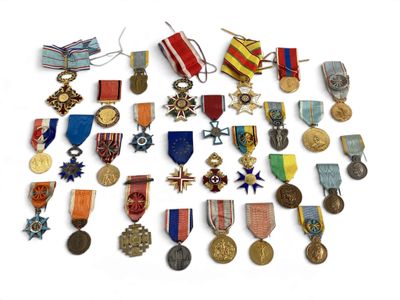 a lot of medals and medals on a white surface
