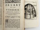 an open book with a drawing of a dome on it