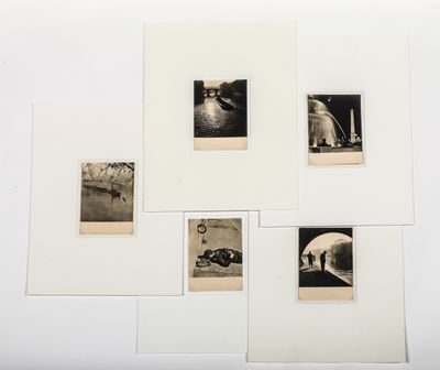 several black and white photographs of people in a boat on a body of water