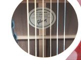 a guitar with a sticker on the back of it