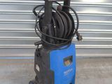 an image of a blue pressurer with a hose on it