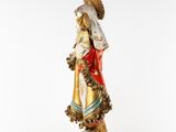 a statue of a woman holding a child in her arms