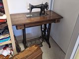 a sewing machine sitting on top of a wooden table