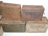 many boxes stacked on top of each other on the floor