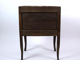 a small wooden table with a drawer on it