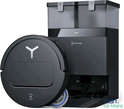 une image représentant un robot aspirateur dont le couvercle est ouvert, sur fond blanc