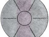 un gros plan sur un sol en pierre circulaire orné d'un motif circulaire