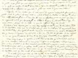 une lettre écrite à l'encre noire sur une feuille de papier