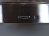 an image of a close up of a metal object on a table