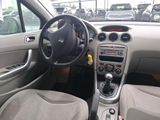 a car dashboard with a steering wheel and dashboard buttons