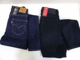 two pairs of levi ' s jeans are sitting on a table