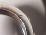 a close up view of a metal ring on a sink