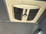 a small air conditioner in the back of a bus
