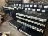 a lot of empty shelves in a store with labels on them