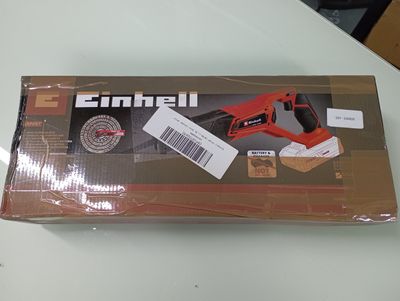 packaging of a box with a red stapler on top of it