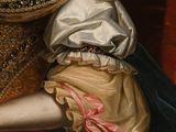 portrait of a woman in a gold dress with a red and blue dress