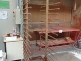 a room that has a bunch of shelves in it