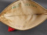 an image of a military hat with writing on it