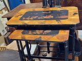 a table that has two chairs on it in a room