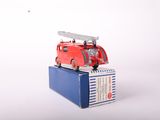 a toy fire truck sitting on top of a box