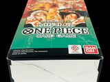 an image of a box of one piece card game sitting on a table