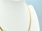 a gold rope necklace on a mannequin mannequin mannequin mannequin mannequin mannequin mannequin mannequin manne
