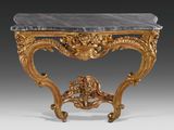 an antique console table with a marble top and gold leaf decoration